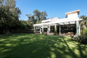 StayVista's Shiraz Villa - Where fitness meets fun with a gym and pool table